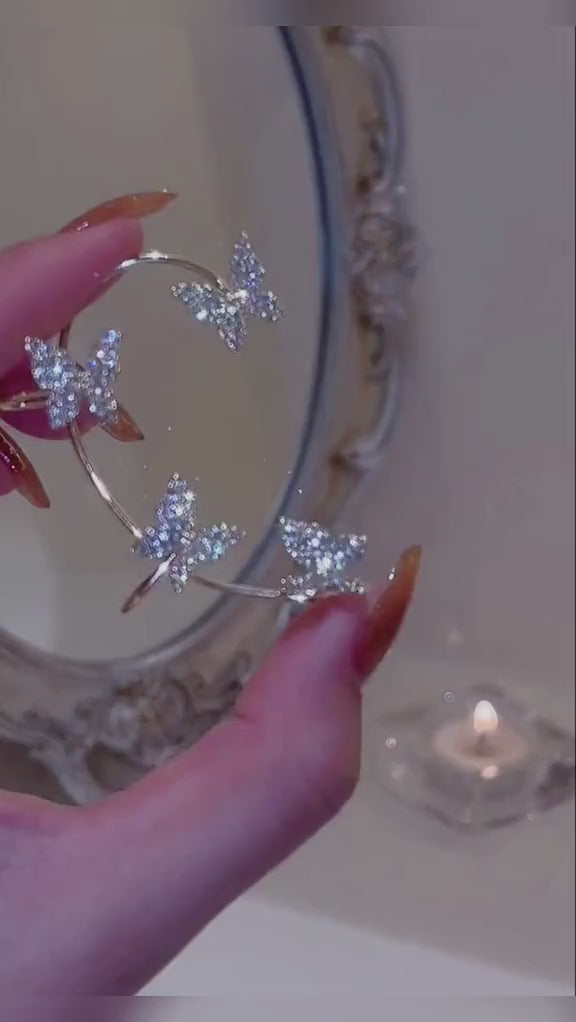 Boucles d'Oreilles Papillon Éclatantes™ video